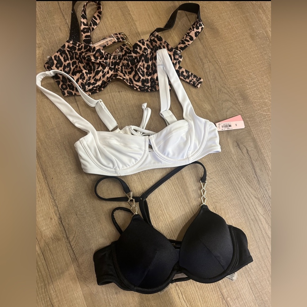 Three Victoria’s Secret bikini tops. All size 32B.